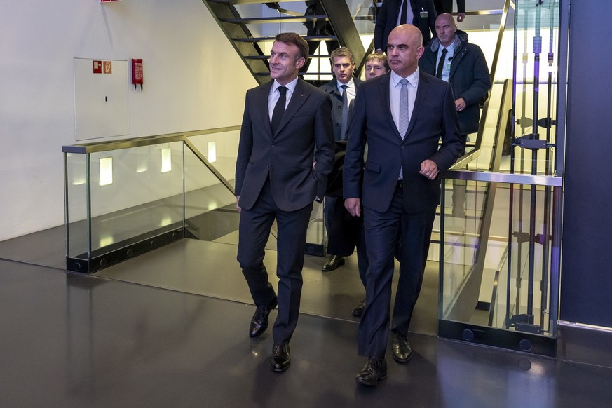 Switzerland's President Alain Berset, right, and French President Emmanuel Macron arrive during a press conference, in Bern, Switzerland, on Wednesday, November 15, 2023. French President Emanuel ...
