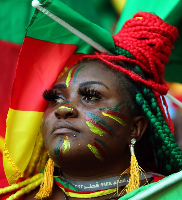 epa10324370 A fan of Cameroon attends the FIFA World Cup 2022 group G soccer match between Switzerland and Cameroon at Al Janoub Stadium in Al Wakrah, Qatar, 24 November 2022. EPA/Abir Sultan