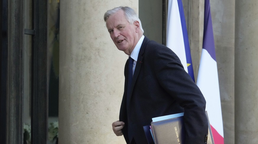France&#039;s Prime Minister Michel Barnier arrives for a weekly cabinet meeting at the Elysee Palace, in Paris, Thursday, Oct. 10, 2024. (AP Photo/Michel Euler)