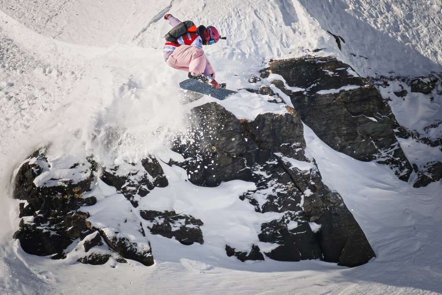 Shayne Blue Sandblom from the U.S. competes to take the 5th place in the men's snowboard category at the Verbier Xtreme Freeride World Tour (FWT) finals on the "Bec des Rosses" mountain ...