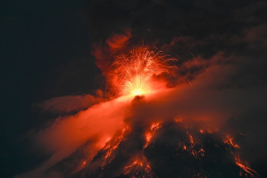 The Fuego volcano erupts 65 kilometers southwest of Guatemala City on August 3, 2026. On Monday, Guatemalan authorities declared a danger alert, the second-highest level, due to a powerful eruption  ...