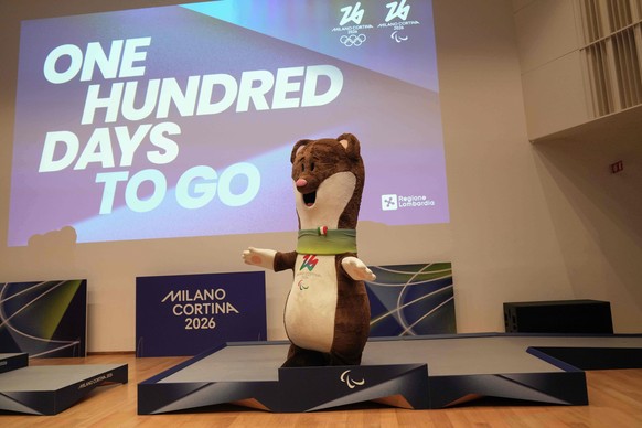 2026 Milan Cortina Winter Olympic podiums are unveiled in Milan, Italy, Wednesday, Oct. 29, 2025, with the mascots Tina and Milo during a press conference marking 100 days to go until the 2026 Milan C ...