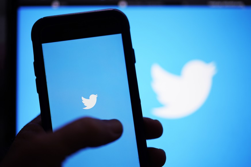 FILE - The Twitter application is seen on a digital device, April 25, 2022, in San Diego. Twitter warned Thursday, July 28, that governments around the globe are asking the company to remove content o ...