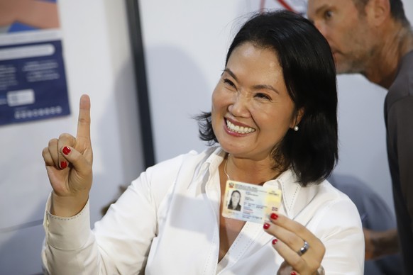 epa12885959 Peru?s Fuerza Popular party Keiko Fujimori reacts after casting her vote in Lima, Peru, 12 April 2026. Peru?s general elections are underway to select national leaders for the 2026?2031 te ...