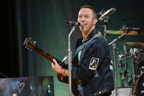Chris Martin of Coldplay performs a song from the band&#039;s 10th studio album &quot;Moon Music&quot; on Monday, Oct. 7, 2024, in the Williamsburg section of the Brooklyn borough of New York. (Photo  ...
