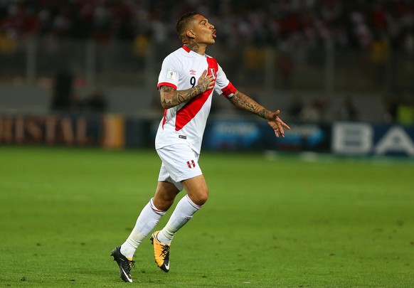 epa06376463 (FILE) - Paolo Guerrero of Peru celebrates after scoring during the FIFA World Cup 2018 qualifying soccer match between Peru and Colombia at the National Stadium in Lima, Peru, 10 October  ...