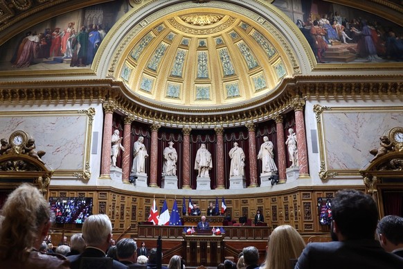 epa10873781 Britain&#039;s King Charles (C) addresses Senators and members of the National Assembly at the French Senate, the first time a member of the British Royal Family has spoken from the Senate ...