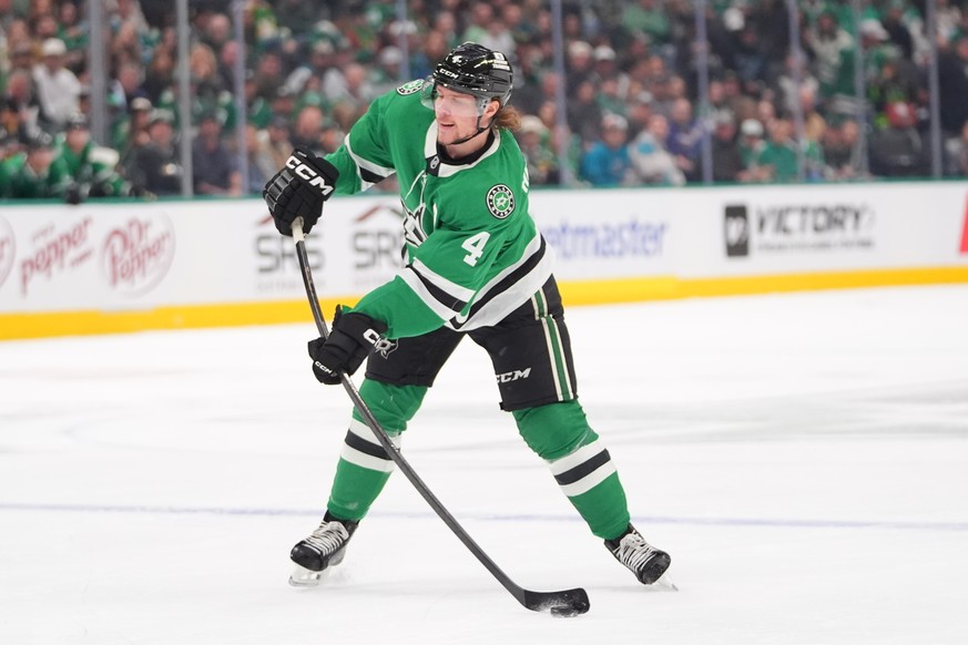 Dallas Stars defenseman Miro Heiskanen hits the puck during the first period of an NHL hockey game against the San Jose Sharks, Friday, Dec. 5, 2025, in Dallas. (AP Photo/LM Otero)
Miro Heiskanen