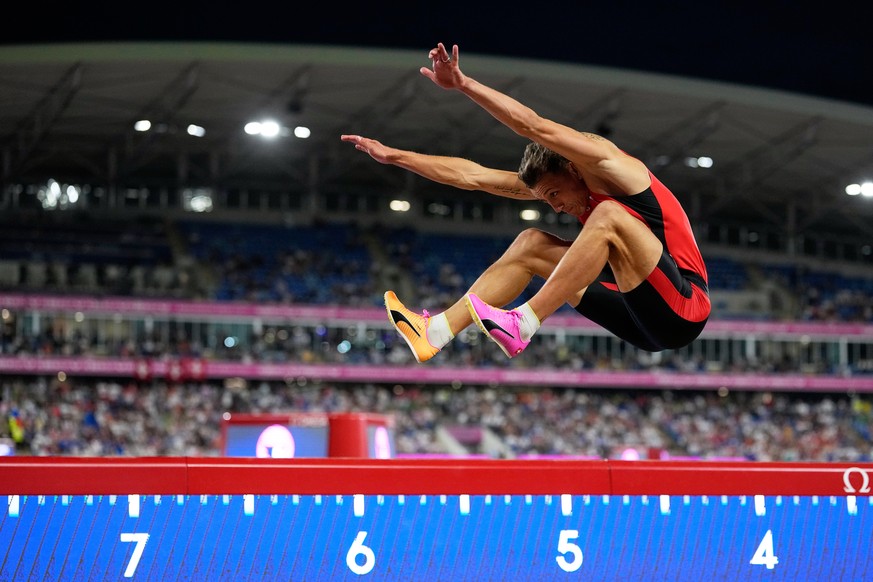 Switzerland's Simon Ehammer makes an attempt in the men's long jump final at the European Athletics Championships in Birmingham, England, Tuesday, Aug. 11, 2026. (AP Photo/Matthias Schrader) ...