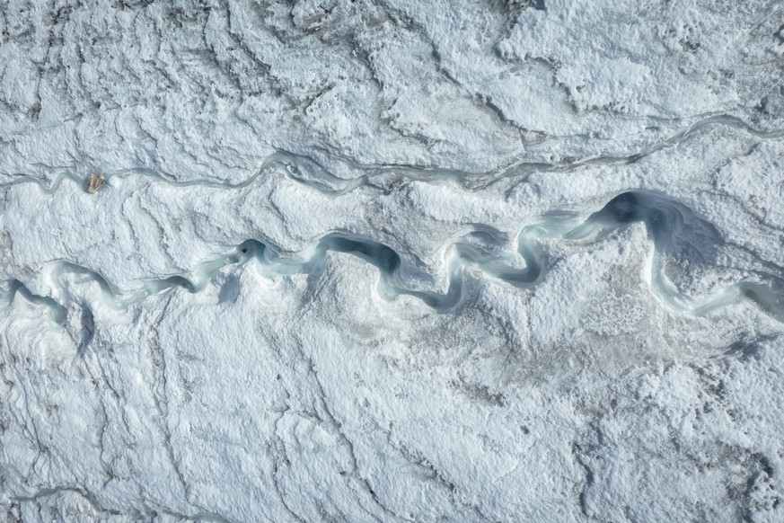 KEYPIX - The Basodino Glacier seen from above, with rocks emerging from the retreating ice, ?Basodino Glacier in the Bavona Valley, Switzerland, on Saturday, September 6, 2025, seen from above.?(KEYST ...