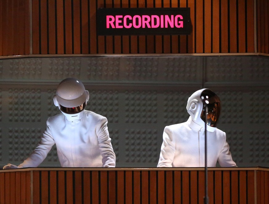 Thomas Bangalter, left, and Guy-Manuel de Homem-Christo of Daft Punk perform at the 56th annual Grammy Awards at Staples Center on Sunday, Jan. 26, 2014, in Los Angeles. (Photo by Matt Sayles/Invision ...