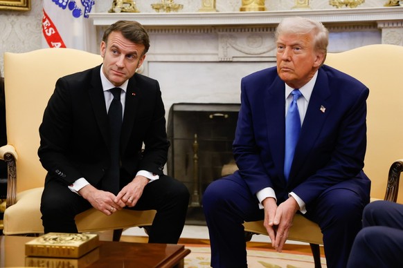 epa11922009 US President Donald Trump (R) meets with French President Emmanuel Macron (L) at the Oval Office of the White House in Washington, DC, USA, 24 February 2025. EPA/LUDOVIC MARIN / POOL
