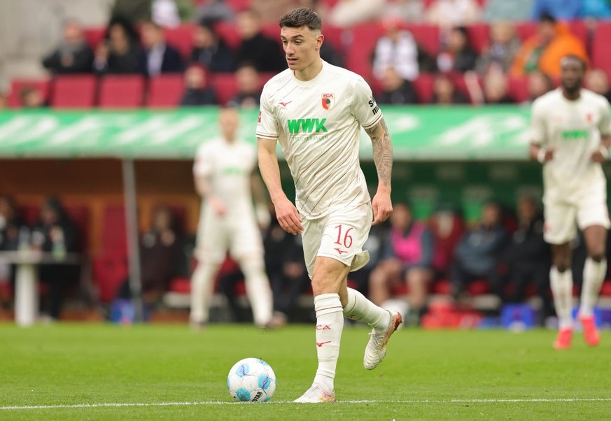 AUGSBURG, GERMANY - MARCH 15: Cedric Zesiger of FC Augsburg plays the ball during the Bundesliga match between FC Augsburg and VfL Wolfsburg at WWK-Arena on March 15, 2025 in Augsburg, Germany. (Photo ...