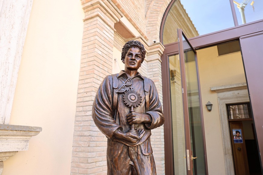 epa12359092 A statue of Saint Carlo Acutis is seen at the Sanctuary of the Renunciation in Assisi, Italy, 07 September 2025. Carlo Acutis, an Italian teenager who died in 2006, will be canonized by Po ...