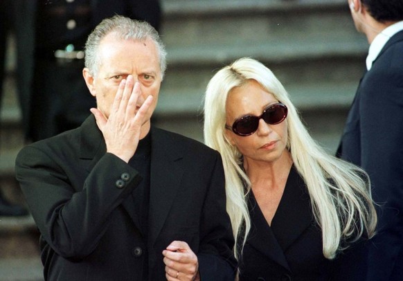 Gianni Versace&#039;s Brother and Sister, Santo and Donatella leave the memorial service in Milan, Italy this afternoon . Photo by Tim Ockenden/PA (Photo by Tim Ockenden - PA Images/PA Images via Gett ...