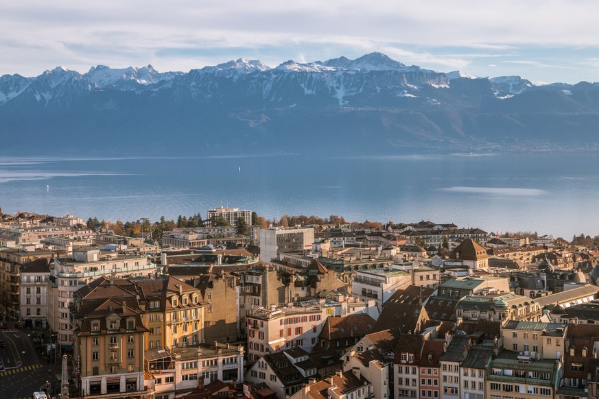 Lausanne old town, lake Geneva, and the French Alps can be seen from Lausanne Cathedral.