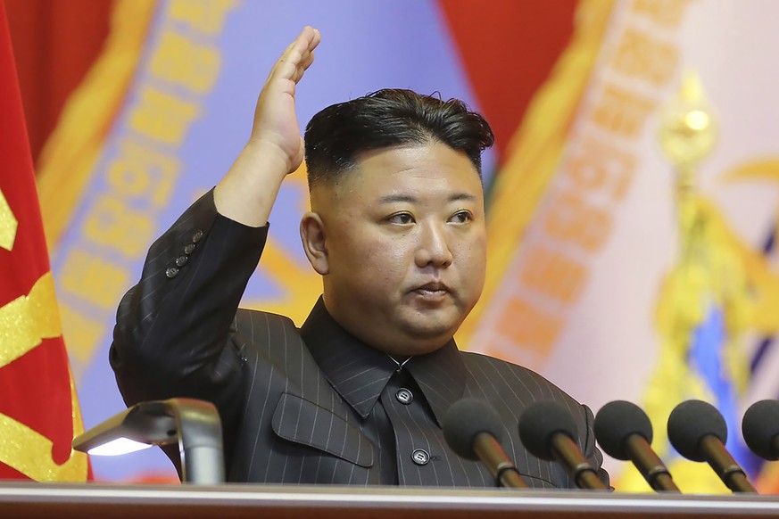 FILE - In this undated file photo provided by the North Korean government on July 30, 2021, North Korean leader Kim Jong Un attends a workshop of the commanders and political officers of the Korean Pe ...
