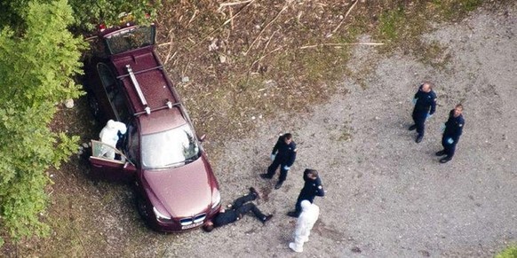 Les enquêteurs sur la scène de la tuerie de Chevaline, au lendemain du crime, le 6 septembre 2012.
