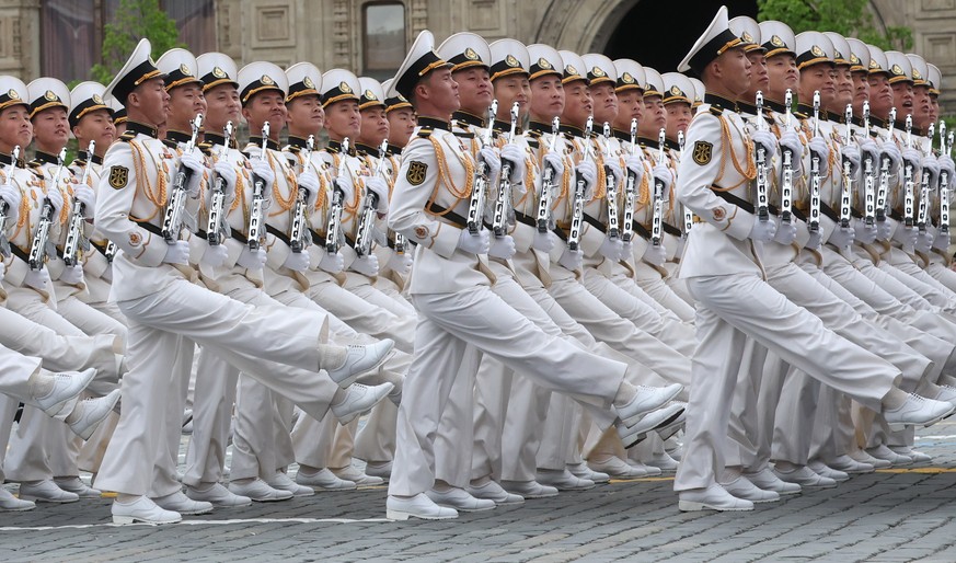 epa12942855 North Korea's servicemen march during the Victory Day military parade on the Red square in Moscow, Russia, 09 May 2026. Russia marks the 81st anniversary of the victory in World War I ...