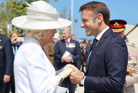 VER-SUR-MER, FRANCE - JUNE 06: Queen Camilla and President of France, Emmanuel Macron attend the UK Ministry of Defence and the Royal British Legion’s commemorative event at the British Normandy Memor ...