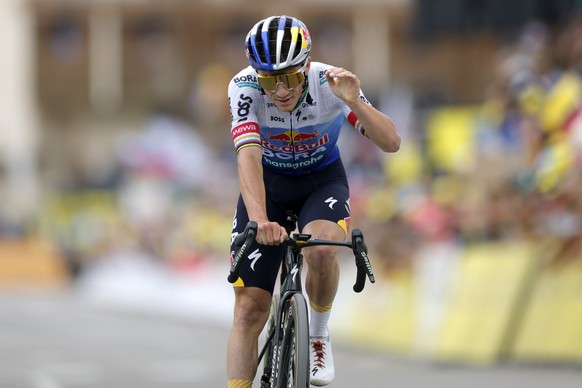 epa13132321 Belgian cyclist Remco Evenepoel of Red Bull - Bora - Hansgrohe crosses the finish line in 2nd place during Stage 20 of the Tour de France, a 170.9 km route from Le Bourg d'Oisans to A ...