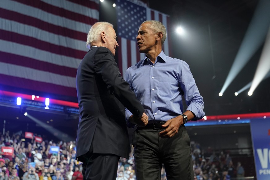 President Joe Biden and former President Barack Obama shake hands after a campaign rally for Pennsylvania&#039;s Democratic gubernatorial candidate Josh Shapiro and Democratic Senate candidate Lt. Gov ...
