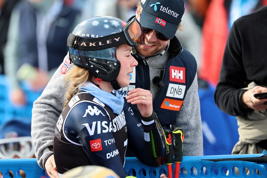 United States' Mikaela Shiffrin is overcome with emotion as her fiancee Norway's Aleksander Aamodt Kilde stands by her side, at the finish area of an alpine ski, women's giant slalom ra ...