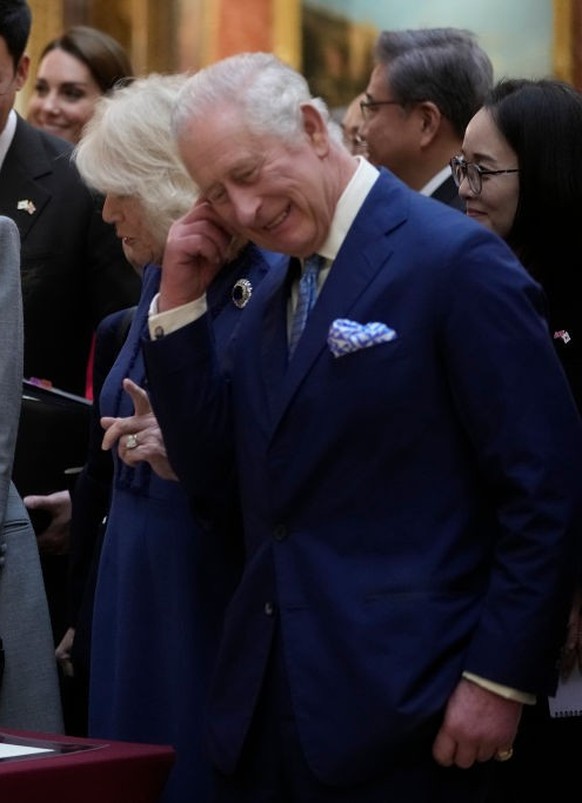 LONDON, ENGLAND - NOVEMBER 21: King Charles III with Queen Camilla shows The President of Korea Yoon Suk Yeol and First Lady, Kim Keon Hee a display of Korean items from the Royal Collection, inside B ...