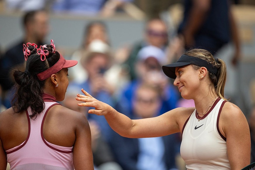 PARIS, FRANCE - MAY 26: Winner Paula Badosa of Spain with Naomi Osaka of Japan at the net after their match in the first round of the singles competition on Court Philippe-Chatrier during the 2025 Fre ...