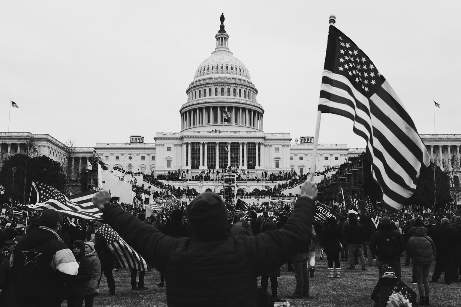 epa08923492 Pro-Trump protesters occupy the grounds of the West Front of the US Capitol, including the inaugural stage and viewing stands, in Washington, DC, USA, 06 January 2021. Protesters stormed t ...