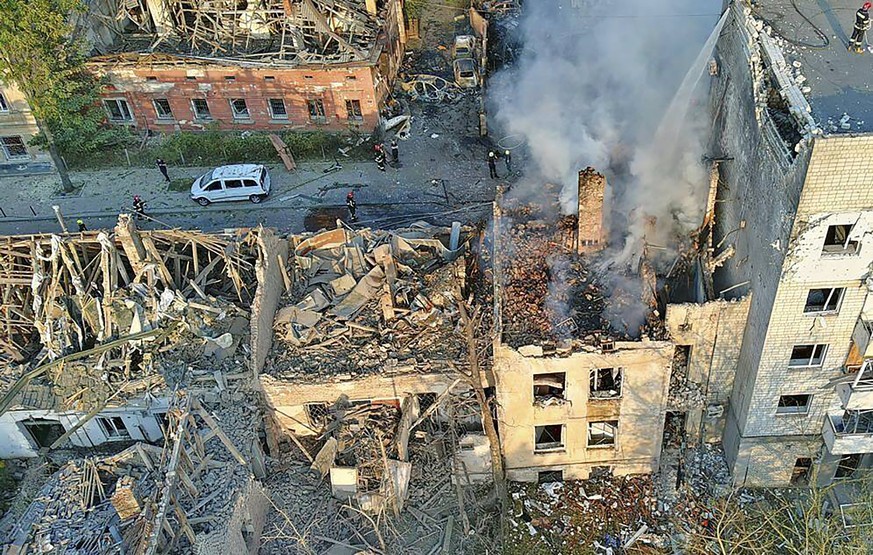 In this photo provided by the State Emergency Service of Ukraine, smoke rises from a building which was destroyed by a Russian strike in Lviv, Ukraine, Wednesday, Sept. 4, 2024.. (State Emergency Serv ...