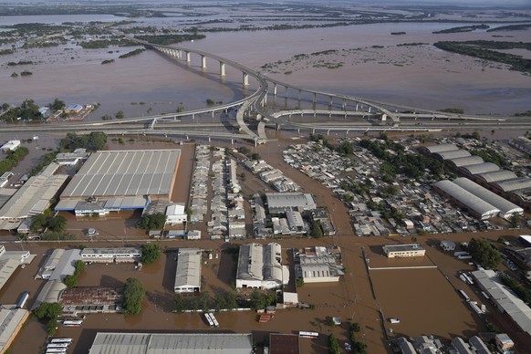 The city of Porto Alegre is flooded after heavy rain in Rio Grande do Sul state, Brazil, Wednesday, May 8, 2024. (AP Photo/Andre Penner)