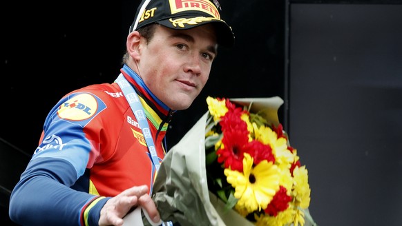 epa11964077 Danish rider Mads Pedersen of Lidl Treck team poses on the podium after winning the 6th stage of the Paris-Nice cycling race over 209.8km from Saint-Julien-en-Saint-Alban to Berre l&#039;E ...