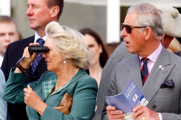 ASCOT, UNITED KINGDOM - JUNE 24: (EMBARGOED FOR PUBLICATION IN UK NEWSPAPERS UNTIL 24 HOURS AFTER CREATE DATE AND TIME) Queen Camilla, King Charles III and Lady Gabriella Windsor watch, from the Royal ...