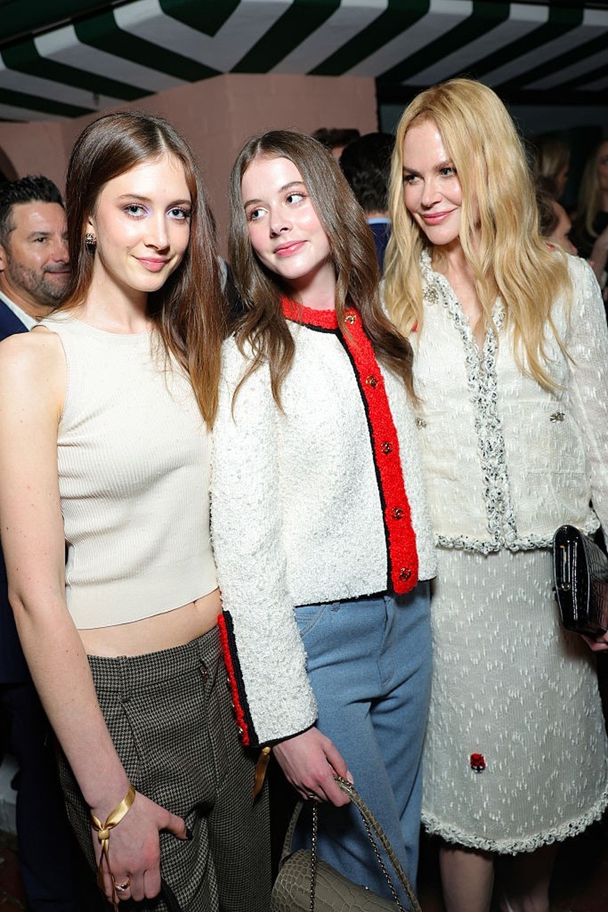BEVERLY HILLS, CALIFORNIA - MARCH 14: (L-R) Sunday Rose Kidman Urban, Faith Margaret Kidman-Urban and Nicole Kidman, all wearing CHANEL, attend the CHANEL and Charles Finch Annual Pre-Oscar Dinner at  ...