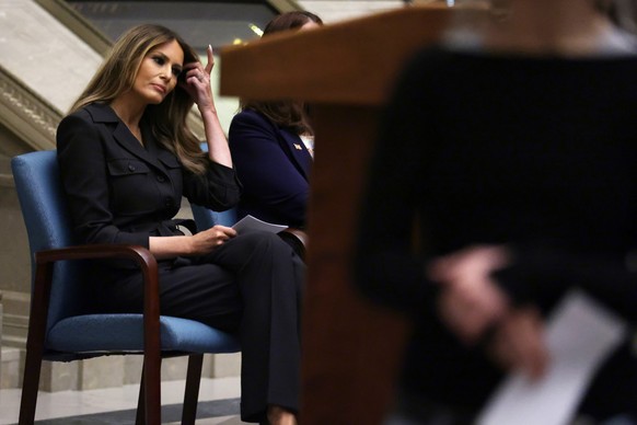 WASHINGTON, DC - DECEMBER 15: Former U.S. first lady Melania Trump waits to be introduced during a naturalization ceremony at the National Archives on December 15, 2023 in Washington, DC. During the c ...