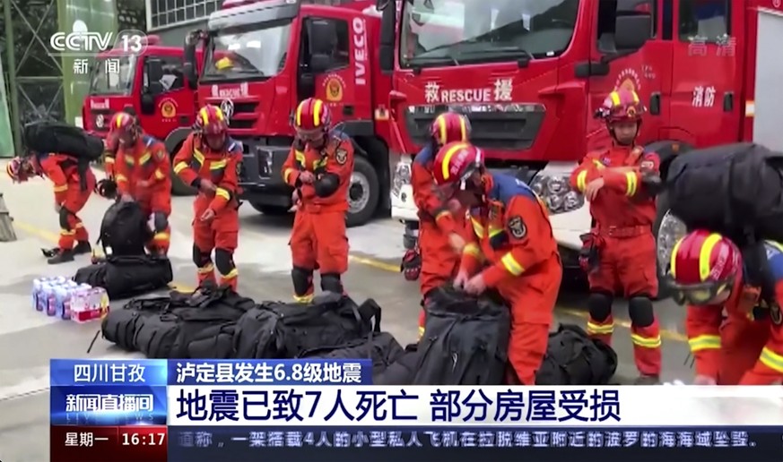 In this image taken from video footage run by China&#039;s CCTV, rescuers prepare their duty following an earthquake in Luding County of southwest China&#039;s Sichuan Province Monday, Sept. 5, 2022.  ...