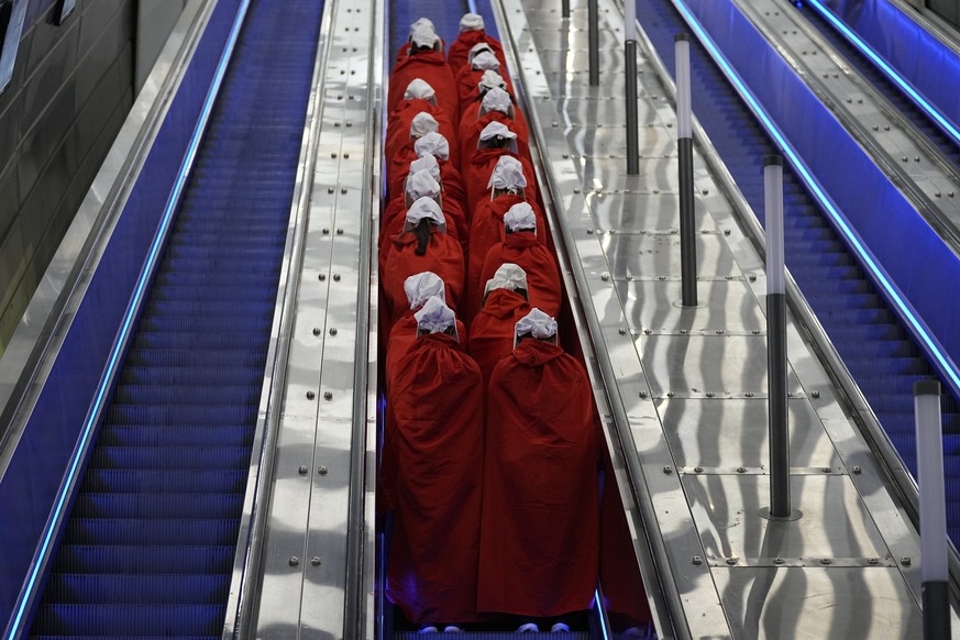 Protesters supporting women&#039;s rights dressed as characters from The Handmaid&#039;s Tale TV series traveling to a protest against plans by Prime Minister Benjamin Netanyahu&#039;s new government  ...