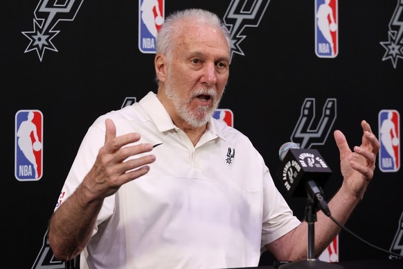 epa10707322 San Antonio Spurs head coach Gregg Popovich answers a question after the Spurs picked Victor Wembanyama for the number one pick in the 2023 NBA draft, at the Spurs practice facility in San ...