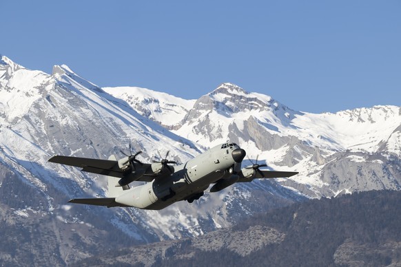epa12628580 Italian Air Force's C-130 transport plane during the repatriation of the bodies of the Italian victims from the 'Le Constellation' bar, in Sion, Switzerland, 05 January 2026 ...