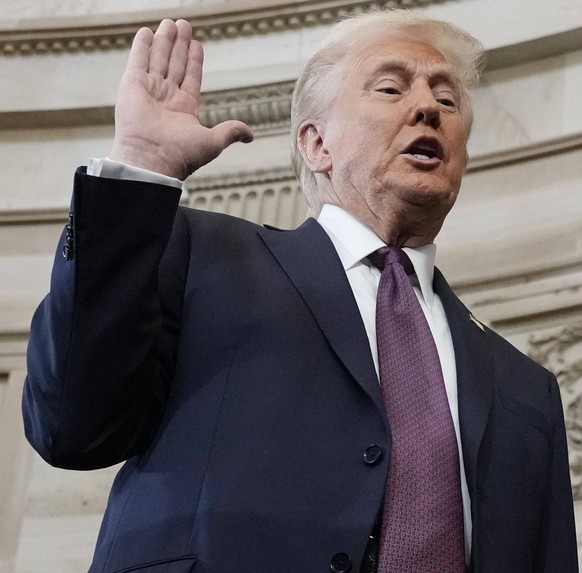 President Trump And VP JD Vance At Presidential Inauguration - USA Donald Trump is sworn in as the 47th president of the United States by Chief Justice John Roberts as Melania Trump holds the Bible du ...