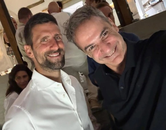 Djokovic et le premier ministre grec Kyriakos Mitsotakis.
