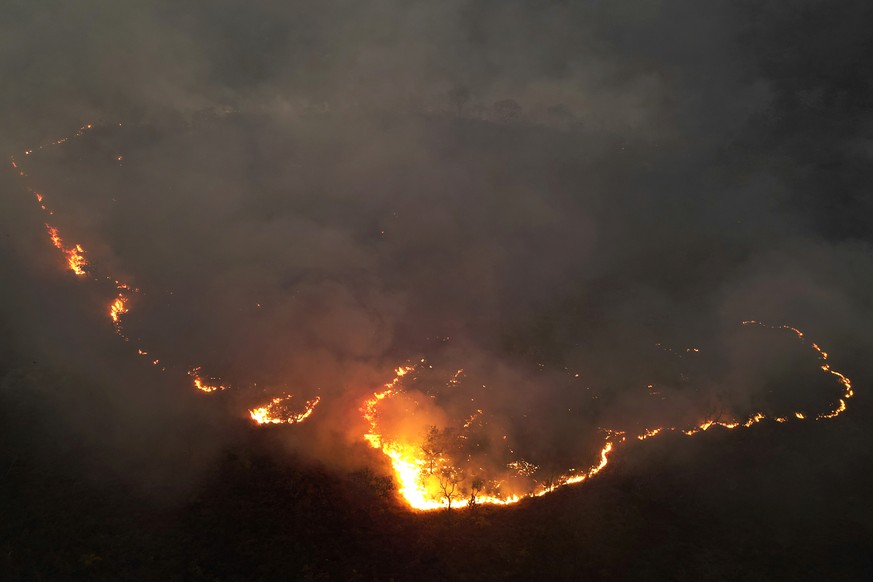 CORRECTS THE CITY - Fires spread through the environmental protection area of Pouso Alto, in Chapada dos Veadeiros National Park, during dry season, in Colinas do Sul, Goias state, Brazil, Monday, Sep ...