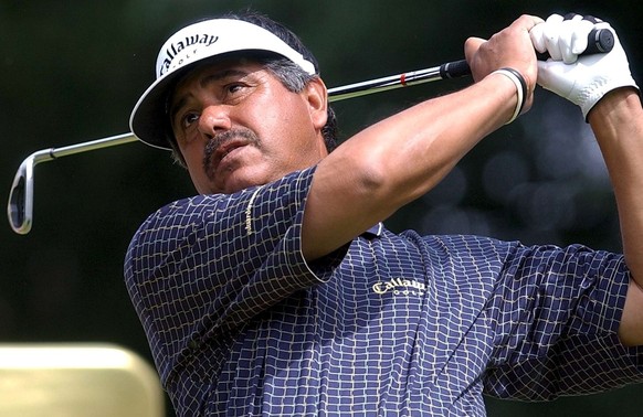 Eduardo Romero of Argentina watches a tee shot, during the Golf Omega European Masters, in Crans Montana, Switzerland, Friday, September 5, 2003. Romero captured the 2nd position at the end of the sec ...