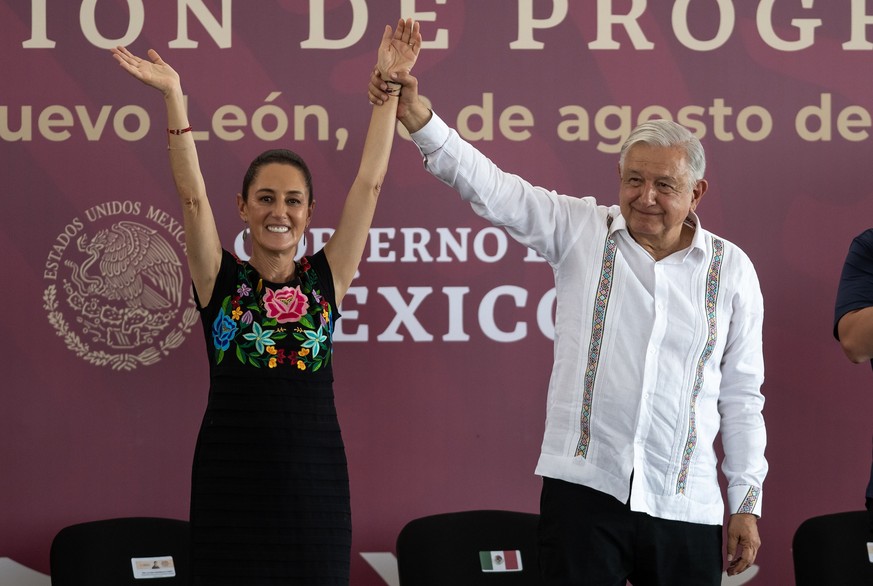 epa11554702 Mexico&#039;s president-elect, Claudia Sheinbaum (L), poses with President Andres Manuel Lopez Obrador (R) during a political event in Monterrey, Mexico, 18 August 2024. Sheinbaum promised ...