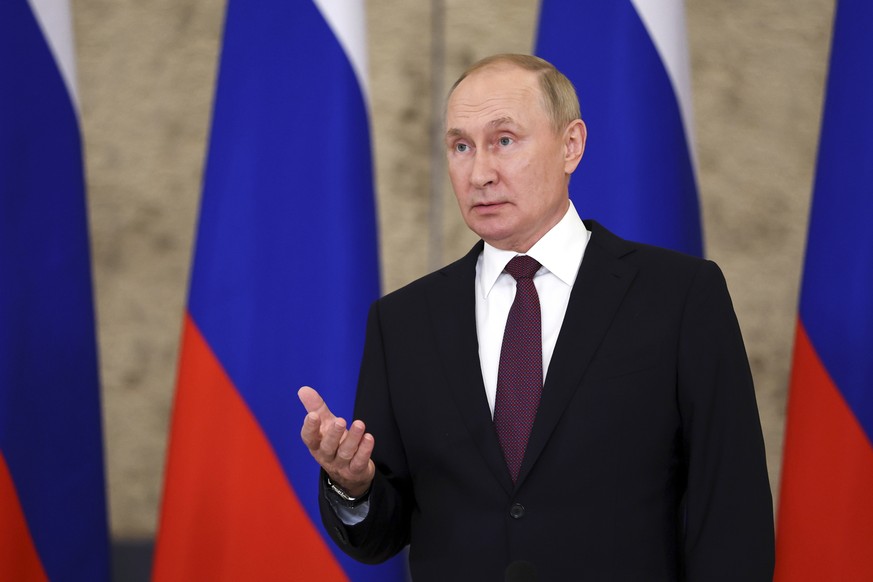 Russian President Vladimir Putin gestures while speaking to the media after the Shanghai Cooperation Organisation (SCO) summit in Samarkand, Uzbekistan, Friday, Sept. 16, 2022. (Sergei Bobylev, Sputni ...