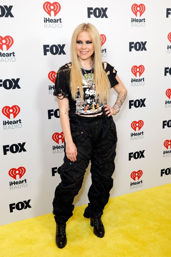 HOLLYWOOD, CALIFORNIA - APRIL 01: Avril Lavigne poses in the press room during the 2024 iHeartRadio Music Awards at Dolby Theatre on April 01, 2024 in Hollywood, California. (Photo by Frazer Harrison/ ...