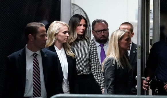 NEW YORK, NEW YORK - APRIL 18: Communications aide to former US President Donald Trump Natalie Harp (2nd L), Trump&#039;s Deputy Communications chief Margo Martin (3rd L) and Trump advisor Jason Mille ...