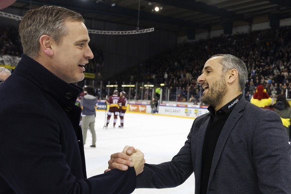 Zug&#039;s Head coach Dan Tangnes, left, shakes hand with Geneve-Servette&#039;s Head coach Jan Cadieux, right, after the Fifth leg of the National League Swiss Championship semifinal playoff game bet ...