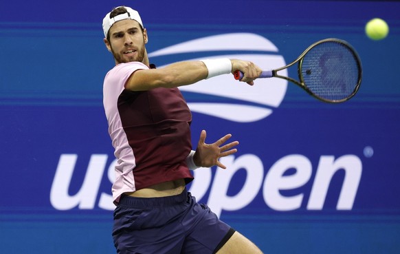 epa10165997 Karen Khachanov of Russia in action against Nick Kyrgios of Australia, during their quarterfinals match at the US Open Tennis Championships, at the USTA National Tennis Center in Flushing  ...
